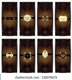 Vector set of golden ornate page decor elements: banners, frames, dividers, ornaments and patterns on dark wood background