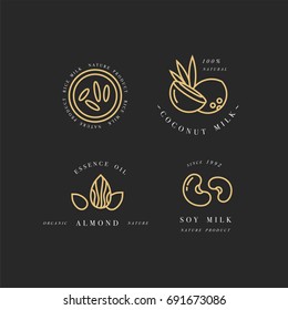 Vector set of golden packaging design elements and icons in linear style - almond, coconut, rice and soy milk - healthy vegan drinks. Logo sign