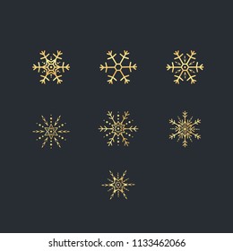 Vector set of golden snowflakes. Gold snowflakes on dark background.  Vector illustration.