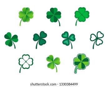 Vector set of green shamrock symbols. Celebration design for St. Patrick's Day. Three and four leaf clovers isolated on white background
