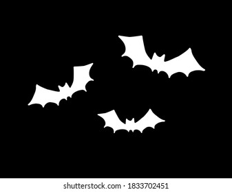 Vector set group of three white flying bat silhouette isolated on black background