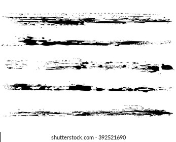 Vector set of grunge brush strokes. Black ink brush strokes. Black paint spots. Element for your design.