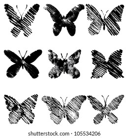 Vector set of grunge butterflies on white background.