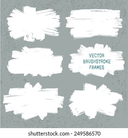 Vector set of grunge paint brush frames on old wall background. Abstract elements for your design