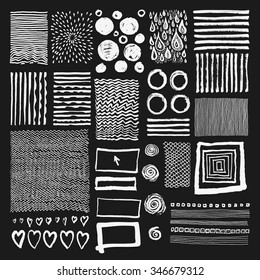 Vector set of grungy hand drawn textures on black background. Lines, circles, crosses, smears, spirals, waves, spirals, scales, hearts, brush strokes, drops, sunbursts, squares. Hand drawn elements