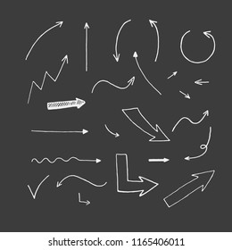 Vector set of hand drawn arrows. Different types of arrows. Vector chalk arrows.