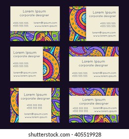 Vector set of hand drawn boho doodle paisley business card template designs.