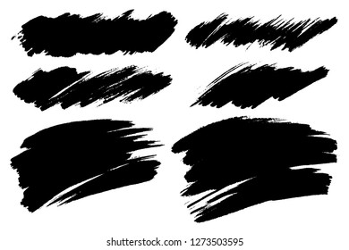 Vector set of hand drawn brush strokes, stains for backdrops. Monochrome design elements set. One color monochrome artistic hand drawn backgrounds.