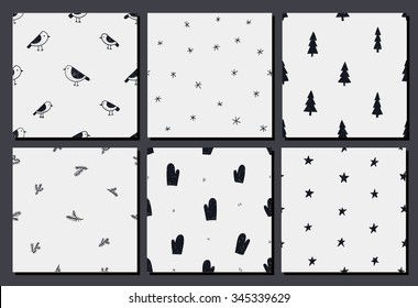 Vector set of hand drawn christmas, winter seamless patterns. Christmas tree branches, birds, mittens, snowflakes, christmas trees, stars