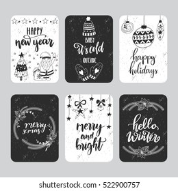 Vector set of hand drawn Christmas greeting cards. Great print design for invitations, posters, tags.Happy New Year. Hello winter. Merry Xmas. Festive banners in black and white colors