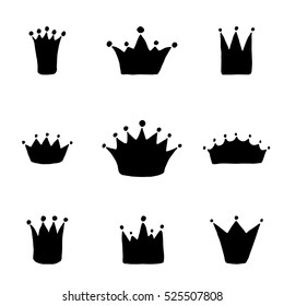 Vector set of hand drawn crowns for young prince or princess.
King and queen crown doodle style.