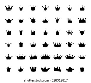 Vector set of hand drawn crowns for young prince or princess.
King and queen crown doodle style.