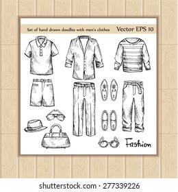 Vector set of hand drawn doodles with men's clothes on white background. Sketches for use in design
