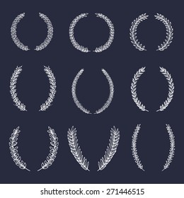 Vector set of hand drawn floral laurels and wreaths.