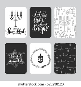 Juego de vectores de tarjetas de felicitación Hanukkah dibujadas a mano. Gran impresión para carteles, invitaciones, tarjetas de vacaciones. Feliz Hanukkah. Deja que la luz brille. Banderas caligráficas en colores blanco y negro