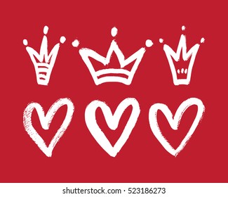 Vector set of hand drawn hearts and crowns.