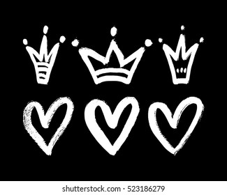 Vector set of hand drawn hearts and crowns.