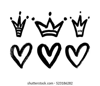 Vector set of hand drawn hearts and crowns.