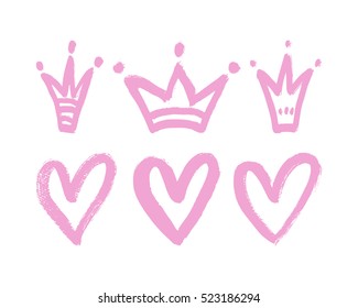 Vector set of hand drawn hearts and crowns.