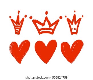 Vector set of hand drawn hearts and crowns.