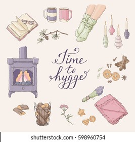 Vector set of hand drawn illustrations with Time to Hygge lettering and cozy home things like candles, socks, tea, fireplace designed in a circle. Danish living concept.