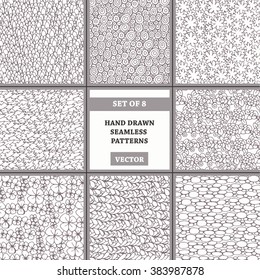 Vector set of hand drawn seamless patterns on beige color. Patterns on the theme of flowers, spring and abstract. Background for use in design, packing, web site, fabric
