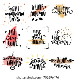 Vector set of hand drawn trendy black lettering with colored blots on theme of autumn.
