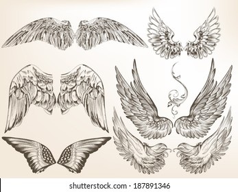 Vector set of hand drawn wings isolated on white