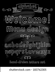 Vector set with hand written ABC letters and typography elements on black background. Chalk design
