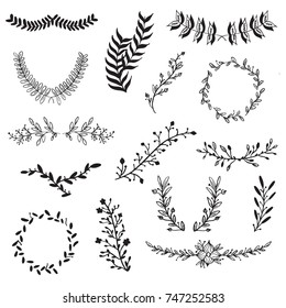 Vector set of handdrawn doodle frames and borders. Handdrawn elements, flowers, branches, swashes and flourishes.