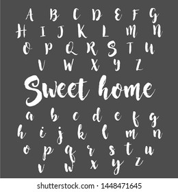 Vector set of handwritten ABC letters, numbers, and symbols. Handcrafted vector script alphabet calligraphy fonts