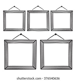 Vector set of hanging picture frames, hand drawn doodle style,   isolated on white background.