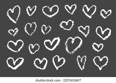 Vector set of hearts, symbol of love. Drawn in chalk, isolated on black background.