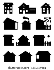 A vector set of houses silhouettes. Different black houses isolated on a white background