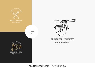 Vector set illustartion logos and design templates or badges. Organic and eco honey labels and tags with bees. Linear style and golden color