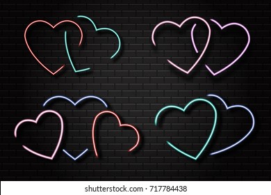 Vector set of isolated realistic heart neon signs on the wall background.