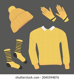 Vector set of knitted wool yellow winter clothes like sweater, hat with pom-poms, striped socks and gloves on the grey background