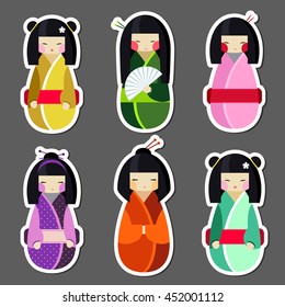 Vector set of kokeshi dolls in different traditional japanese clothes. Collection of beautiful and cute women or girls toys