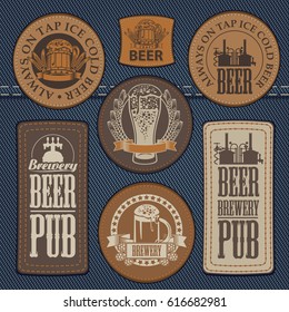 vector set of labels for jeans with pictures on the topic of beer pub on a background of denim