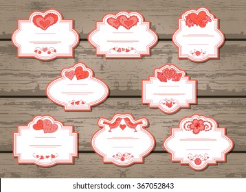 Vector set of labels with Valentine's Day elements: hearts, flowers and love birds. In pink color.