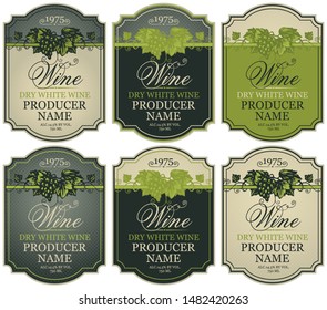 Vector set of labels for white wine with bunches of grapes and calligraphic inscriptions in retro style in figured frames