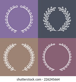 Conjunto vectorial de coronas de laurel en forma de contorno - ramas redondas con hojas