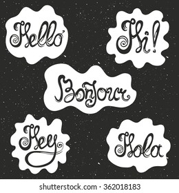 Vector set with lettering greetings - hello, hola, bonjour, hi, hey.VIntage background