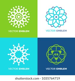 Vector set of logo design templates emblems with flower leaves and lines. Medical spa concepts. Blue green badges for yoga studios and classes, holistic and alternative medicine, organic food.