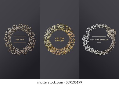 Vector set of logo design templates and monogram frames in trendy linear style with flowers and leaves made with golden foil on black background  - luxury products, organic cosmetics packaging designs