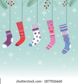 Vector set of Multicolored Christmas socks for gifts in winter nature.