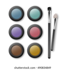 Vector Set of MultiColored Light Blue Pink Brown Violet Yellow Turquoise Ocher Eye Shadows in Round Black Transparent Plastic Case with Makeup Brushes Applicators Top View Isolated on White Background