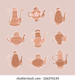 vector set of nine clay teapots on a light background