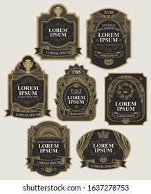 Vector set of ornate labels in black and gold colors in retro style. Collection of vintage labels decorated by ribbons, crowns, curls in figured frames with place for text and logo