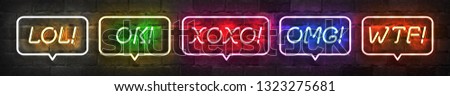 Vector set of realistic isolated neon sign of LOL, Ok, XOXO, OMG and WTF logo for template decoration on the wall background. Concept of social media expressions.